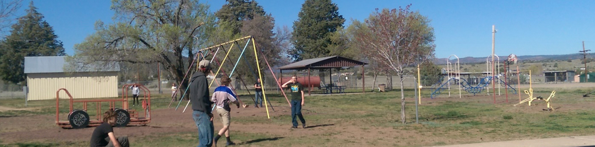 Children playing on playground equipment 